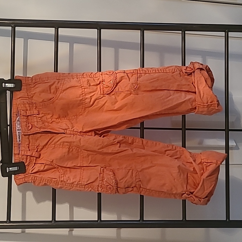 Girl's orange cargo Capri pants with adjustable waistline